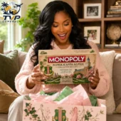 Alpha Kappa Alpha Collector's Edition Monopoly Board Game 2026 1 Woman holding Alpha Kappa Alpha Monopoly Collector Edition board game