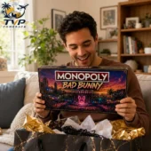 Bad Bunny Un Verano Sin Ti Limited Collector Edition Monopoly Board Game 3 Man smiling while holding a Bad Bunny Monopoly collector edition board game.