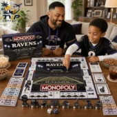Baltimore Ravens Collector Edition Monopoly Board Game 1 A father and son playing the Baltimore Ravens Monopoly Collector's Edition game.