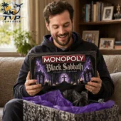 Black Sabbath Collector's Edition Monopoly Board Game 2026 2 Man holding a Monopoly Black Sabbath Collector Edition board game