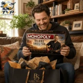 Blake Shelton Collector's Edition Monopoly Board Game 3 Man holding a Blake Shelton Collector Edition Monopoly game board box.