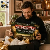 Man excitedly opening a Monopoly Breaking Bad Collector Edition game board from Tvpcomebackshop