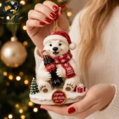 Coca-Cola 140 Years polar bear ornament held by hands