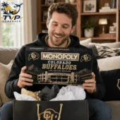 Colorado Buffaloes Collector Edition Monopoly Board Game 2 Man holding a Colorado Buffaloes Monopoly board game collector edition from Tvpcomebackshop