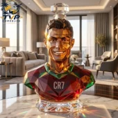Cristiano Ronaldo CR7 geometric crystal portrait bust decanter on a table.