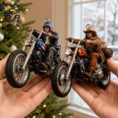 Two miniature biker ornaments featuring iconic riders held in hand for Tvpcomebackshop