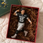 Las Vegas Raiders football player ornament in a gift box by Tvpcomebackshop