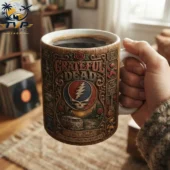Grateful Dead Rustic Campfire Mug – Vintage Hippie Coffee Cup with Forest Artwork 3 Grateful Dead themed ceramic coffee mug with vintage art held in hand