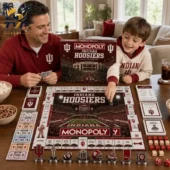 Father and son playing Indiana Hoosiers collector edition board game at home.