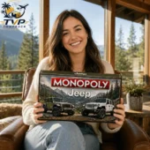 Jeep 85th Anniversary Limited Collector Edition Monopoly Board Game 2 Woman holding Jeep Monopoly Collector Edition board game