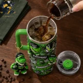 Kawasaki Ninja Team Green Ride Hard Kawasaki Life Tumbler with Handle 2026 2 Green Kawasaki themed tumbler with matching crocodile keychain and lid on a wooden table.