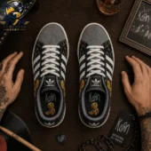 Korn Issues Are You Ready Casual Air Force Shoes 2 Top view of Adidas Korn collaboration sneakers on a wooden table with music-themed accessories.