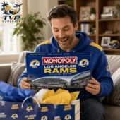 Man holding a Los Angeles Rams Collector Edition Monopoly game