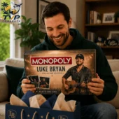 Luke Bryan Collector's Edition Monopoly Board Game 2026 1 Man holding a Luke Bryan Collector Edition Monopoly board game at home