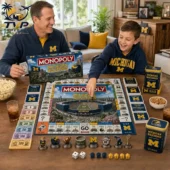 Michigan Wolverines Collector's Edition Monopoly Board Game 2026 2 Father and son playing Michigan Wolverines Monopoly edition board game