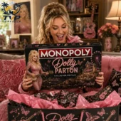 Monopoly Anime x Dolly Parton Collector's Edition Board Game 2 A woman holding a Dolly Parton Collector Edition Monopoly board game box.