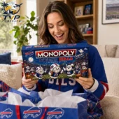 Monopoly Buffalo Bills x Boo Collector Edition Board Game 2 A woman holding a Buffalo Bills Monopoly Collector Edition board game.