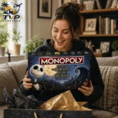Monopoly Disney Tim Burton's The Nightmare Before Christmas Collector's Edition Board Game 2 Woman holding The Nightmare Before Christmas Monopoly collector edition board game.