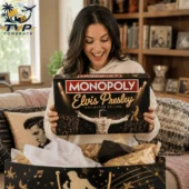 Monopoly Elvis Presley Limited Collector's Edition Board Game 1 Woman holding Elvis Presley Collector Edition Monopoly board game