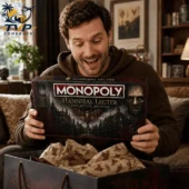 Monopoly Hannibal Lecter Collector Edition Board Game 2 Man holding Hannibal Lecter Monopoly Collector Edition board game