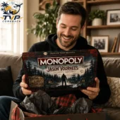 A man holding a Monopoly: Jason Voorhees Collector's Edition board game.
