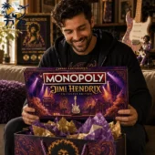 Monopoly Jimi Hendrix Collector's Edition Board Game 2 Man holding a Jimi Hendrix Collector Edition Monopoly game