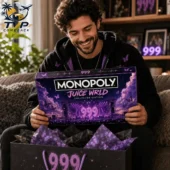 Man holding a Juice Wrld Monopoly collector edition game box