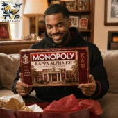 Monopoly Kappa Alpha Psi Collector's Edition Board Game 1 Man holding a Kappa Alpha Psi Monopoly Collector Edition game board