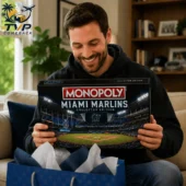 Monopoly Miami Marlins Collector's Edition Board Game 1 Man holding Miami Marlins Monopoly collector edition board game