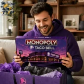 Monopoly Taco Bell Collector's Edition Board Game 2 Man holding a Taco Bell Collector Edition Monopoly game box from Tvpcomebackshop