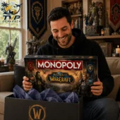 Monopoly World of Warcraft Collector's Edition Board Game 1 Man smiling while holding a World of Warcraft Collector Edition Monopoly board game