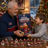 Montreal Canadiens Youppi! Mascot Holiday Advent Calendar 2026 2 An elderly man and a young boy holding a Montreal Canadiens 24-day holiday mascot advent calendar with figurines on the table.