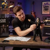 Ozzy Prince of Darkness Collector Building Brick Set 2026 2 Man assembling an Ozzy Osbourne collectible figure from Tvpcomebackshop