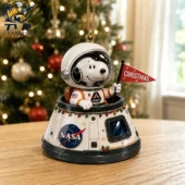Snoopy astronaut Christmas ornament in a NASA space capsule