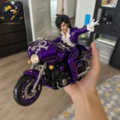 Prince Purple Rain Waving Motorcycle Christmas Ornament 4 Hand holding a Prince figurine on a purple motorcycle from Tvpcomebackshop