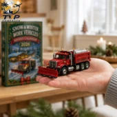 Snow & Winter Work Vehicles Advent Calendar 2026 4 A hand holding a red snow plow truck die-cast model with an advent calendar in the background from Tvpcomebackshop