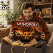 Man holding The Lion King Collector Edition Monopoly board game