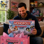 The Powerpuff Girls Collector's Edition Monopoly Board Game 1 Man holding a Powerpuff Girls Monopoly collector edition board game.