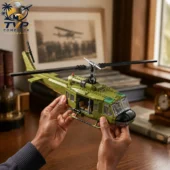 Vietnam War Bell UH-1 Huey 70th Anniversary Collector's Building Brick Sets 2026 3 Person holding a detailed green military helicopter brick building set