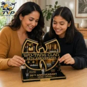 Wu Tang Clan 35th Anniversary Collectible Building Brick Set 2026 2 A woman and a girl assembling a Wu-Tang Clan 35th anniversary commemorative building set from Tvpcomebackshop.