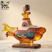 Yellow Submarine Collectible Edition Decanter Bottle 1 Yellow Submarine glass decanter on wooden base by Tvpcomebackshop