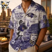 Man wearing a Baltimore Ravens themed Hawaiian shirt with team motifs