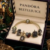 Pandora Beetlejuice gold bracelet with character charms in a presentation box