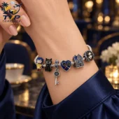 Coraline Collectible Silver Charm Bracelet Set 2026 1 Coraline themed silver charm bracelet featuring iconic characters and motifs.