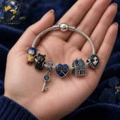 Coraline Collectible Silver Charm Bracelet Set 2026 2 Coraline themed charm bracelet on a hand
