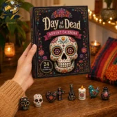 Day of the Dead 24-Day Advent Calendar 2026 2 Hand holding a Day of the Dead advent calendar with 24 acrylic ornaments by Tvpcomebackshop