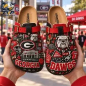 Georgia Bulldogs NCAA 3D Embossed Suede Clogs 2 Georgia Bulldogs themed Birkenstock style clogs held in hands