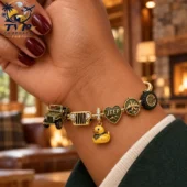 Jeep-themed charm bracelet with off-road accessories on a wrist