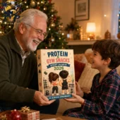 Protein & Gym Snacks Collection Advent Calendar 2026 1 A grandfather and grandson holding a 2026 Protein and Gym Snacks Advent Calendar with 24 acrylic ornaments.