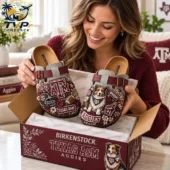 Texas A&M Aggies Suede Clogs 1 Woman holding custom Texas A&M Aggies themed Birkenstock clogs from Tvpcomebackshop